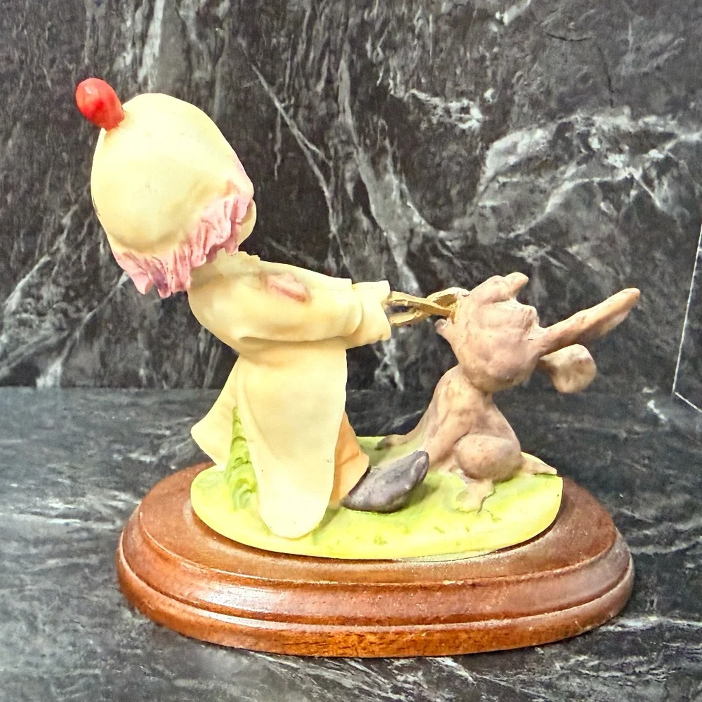 Dentist Clown Pulling Rabbits Tooth Figurine